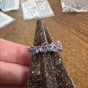 She is a rockstar bomb party ring, BP. March birthday.